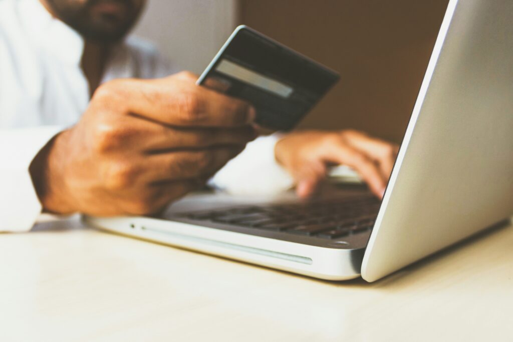 Person conducting credit repair on their computer. 